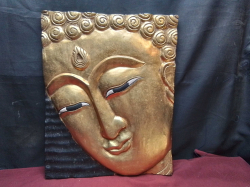 A Wooden Gilt of Buddha Head Panel. W.41 H.52 Cm.