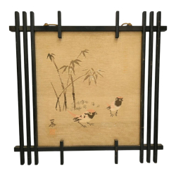 An old handmade silk art embroidery framed depicting bamboo and birds with the sign .47x47Cm.