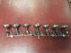 A Brass Set of Candle Sticks 7 Piece. L.65 Cm.