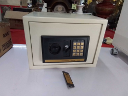 A Small Safe Box with key.