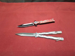 1 folding knife and 1 butterfly knife.