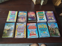 A Large Collection of 10 Uncle John's Bathroom Readers Books.