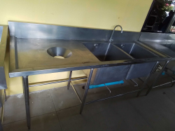 A Large Stainless Steel Double Drainer Sink Unit with Tap and Drainer with Wast Port Hole. L.200 D.70 H.87 Cm.