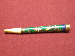 A Rare Chinese Cloisonne Cigarette Holder Early 20th Century. Decorated in Green, Blue and Red Enamels. L.9 Cm.