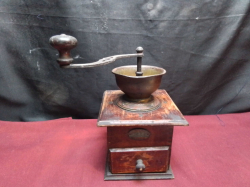 A Large Old Coffee Grinder.