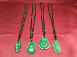 4 Dark Green Jade Pendants on Jade Necklaces. 