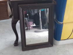 A Very Heavy Wooden Framed Mirror. W.50 H.69 Cm.