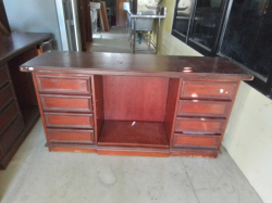 A 1920s Wooden Desk with 8 Drawers. D.46 L.153 H.77 Cm.