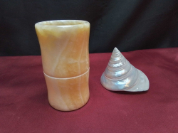 An Old Brush Pot W.7 H.12 Cm. and A Shell.