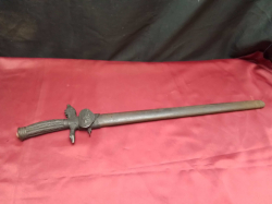 A Handmade Beautiful German 19. Century Style Hunting Dagger decorated with deer handle and embossed blade. L.60 Cm.