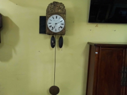 A French Comtoise Wall Clock Ceramic Face and Embossed Brass Circa 1850. H.41 W.28 D.14 Cm.