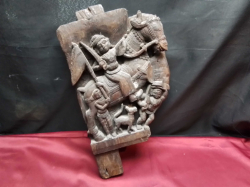 A Balinese Craved Wooden Wall Hanging. H.43 W.24 Cm.