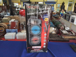 A 700 Watt Karaoke Radio Bluetooth Speaker with Microphone.
