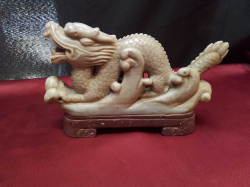 A vintage Jade Dragon in Marble base. W.19 H.12 Cm.