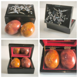 2 marble eggs use as Baoding ball in a vtg. Black lacquer box w/ mother of pearl inlaid