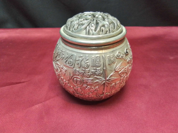 Chinese silver plated lidded jar decorated with Chinese symbols mark to base. W.10 H.10 Cm.