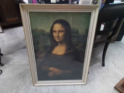A Large print of Mona Lisa with glazed and framed. W.64 H.87 Cm.