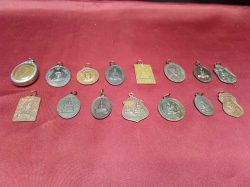 15 vintage bronze Thai amulets 