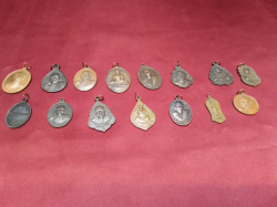 15 vintage bronze Thai amulets
