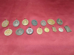 15 vintage bronze Thai amulets 