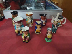 9 Small and Minature Toby Jugs.