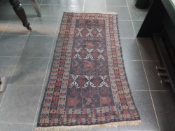 An Antique Handmade Carpet
92x170 cm.