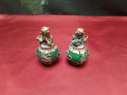 A pair of vintage Green jade decorated by Foo of Dogs.