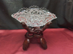 A Crystal bowl in wooden stand. W.27 H.25 Cm.  