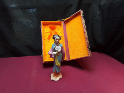 A limited edition boxed Chinese lady with a fan 9