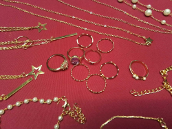 A Job Lot of bracelets, necklaces and rings in a box.