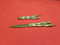 2 butterfly flicking knifes