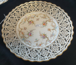 A beautiful Dressden hand painted floral and gold Reticulated Decorated and painted by Lamm,A Circa 1887. W.29 Cm.