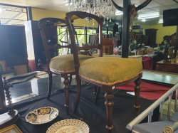 A good pair of Victorian Circa 1870 walnut chairs with hand-carved decoration
