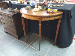 A Georgian style mahogany inlaid half round console table with very fine inlaid tapering legs Stamp with very good maker mark to the back. D.38 W.80 H.71 Cm. 