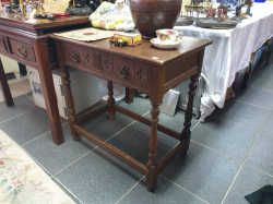 A two drawer solid Oak Jacobean style Oak side table with the original handles. D.44 W. 75 H.74 Cm.