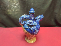 An Old Porcelain Rice Wine Decanter with Dragon Features to Handle & Spout.