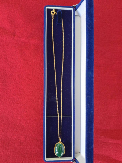Beautiful Gold plated necklace with lovely green stone pendant.