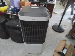 A Large Hatari Cooling Fan with remote.