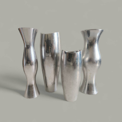 A set of 4  silver alloy metal bud vase , modern style from Nambe studio
