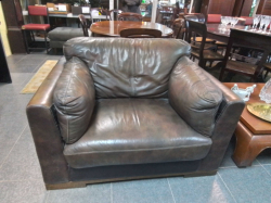 A Large Leather Sofa. W.122 D.90 H.82 Cm.