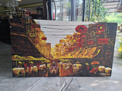 A Large Oil painting on Canvas depicts a vibrant street scene, possibly in Bangkok by the artist Saengkaew Bongkotmat, Kawe Gallery in Chiang Mai