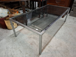 A Metal framed glass table. 196x123cm H.40 cm