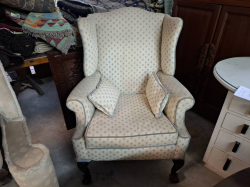 An Old wing back easy chair