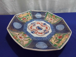 A Chinese Octagonal Plate in Polychrome Decoration with Early mark to base. W.22 Cm.