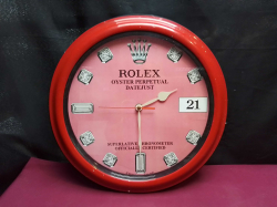 A Large Old Rolex, Shop Wall Clock, in working order. W.35 Cm.