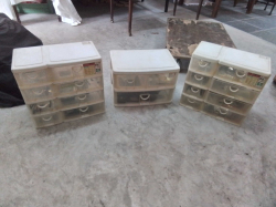 Set of 3 Stacking Plastic Drawers, with Clock smiths’ tools and spare parts.