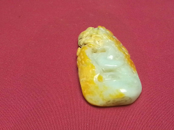  A carved green jade piece 7cm long 