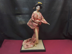 A large Edo period costume Japanese doll on stand. H.46 Cm.