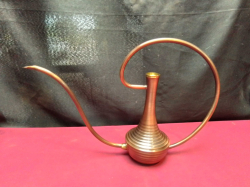 A brass flower vase in a shape of pot. W.36 H.25 Cm.  