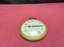 A Large pocket style clock.W.9 Cm.